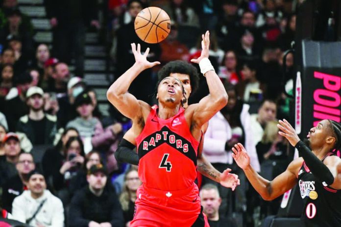 sports_Toronto_resized_compressed Toronto Raptors forward Scottie Barnes loses handle of the ball as Philadelphia 76ers’ Tyrese Maxey looks on. PHOTO COURTESY OF DAN HAMILTON/IMAGN IMAGES