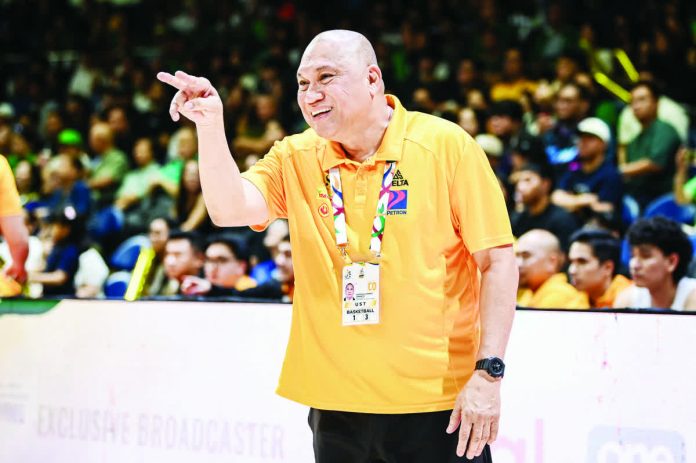sports_UST_resized_compressed Under Alfredo “Pido” Jarencio’s watch, UST has re-entered the UAAP competitive picture, reaching the Final Four in back-to-back seasons. UAAP PHOTO