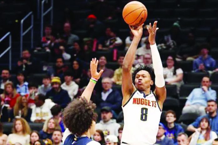 sports_Watson_resized_compressed Denver Nuggets’ Peyron Watson pulls up for a basket. PHOTO BY FIELD LEVEL MEDIA