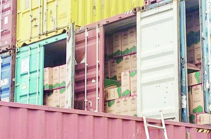 tobacco_smuggling_copy_resized_compressed Tobacco products in shipping containers are seen during a press briefing held by the Philippine National Police to present details on the discovery and seizure of unregistered imported tobacco products valued at around P1.5 billion during a New Year’s Eve operation, in Maysilo, Malabon on January 1, 2026. PHILIPPINE NATIONAL POLICE PHOTO