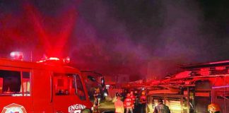 Firefighters battled a blaze that razed 11 houses in Purok Magti-ayon, Barangay 10, Bacolod City on February 11, displacing 24 families. MAYOR GREG GASATAYA FB PHOTO