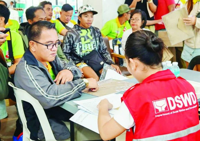 Cash_aid_copy_resized_compressed Each of the 89 tourism workers from the municipalities of Malay and Kalibo, Aklan affected by Tropical Cyclone “Tino” received P10,325 in cash assistance under the Emergency Cash Transfer (ECT) program of the Department of Social Welfare and Development Field Office VI (DSWD-6). DSWD-6 PHOTO