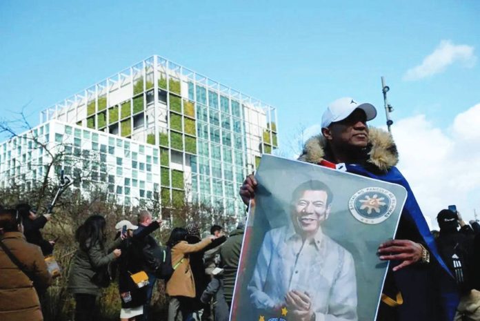 Supporters of former President Rodrigo Duterte stage a rally outside the International Criminal Court in The Hague, Netherlands. AFP