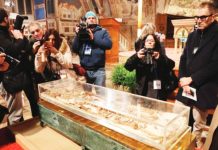 Bones of St. Francis of Assisi go on public display in Italy The skeletal remains of St. Francis of Assisi is displayed to the public for the first time in history in a glass shrine in front of the altar of the Lower Basilica in Assisi, Italy. The skeleton is encased in a nitrogen-filled plexiglass case in front of the altar. EPA