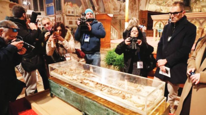 Francis The skeletal remains of St. Francis of Assisi is displayed to the public for the first time in history in a glass shrine in front of the altar of the Lower Basilica in Assisi, Italy. The skeleton is encased in a nitrogen-filled plexiglass case in front of the altar. EPA