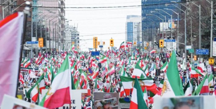Iran The largest rally against Iran was held in Toronto, Canada over the weekend where an estimated 350,000 people turned out to protest. ANDOLU VIA GETTY IMAGES