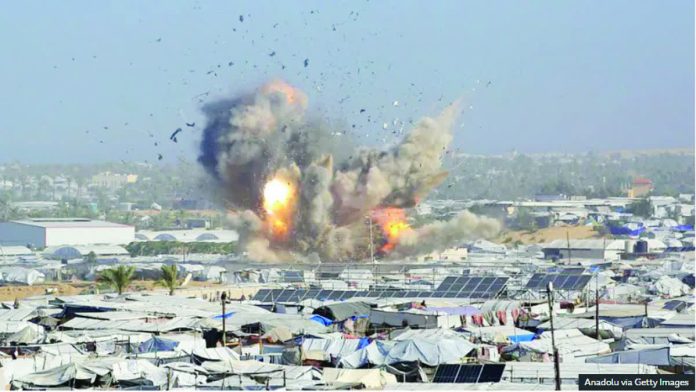 Israel_copy_resized_compressed Smoke rises after an airstrike hit a building in the al-Mawasi area of Khan Yunis, Gaza despite the ceasefire, on January 31, 2026. ANADOLU VIA GETTY IMAGES