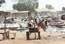 Attackers burned down shops and homes during the raid on Woro village in Nigeria’s Kwara state. BBC