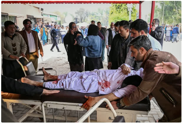 Pakistan_compressed An injured man is taken to a hospital following an explosion at a mosque in Islamabad, Pakistan. AAMIR QURESHI/AFP/GETTY IMAGES
