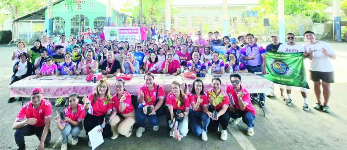 Photo_Group_resized_resized_compressed (1) More than 200 participants and volunteers, representing various organizations and groups, joined the Panay News’ tree planting activity in Barangay Pagsanga-an, Pavia, Iloilo, on February 14, 2026.