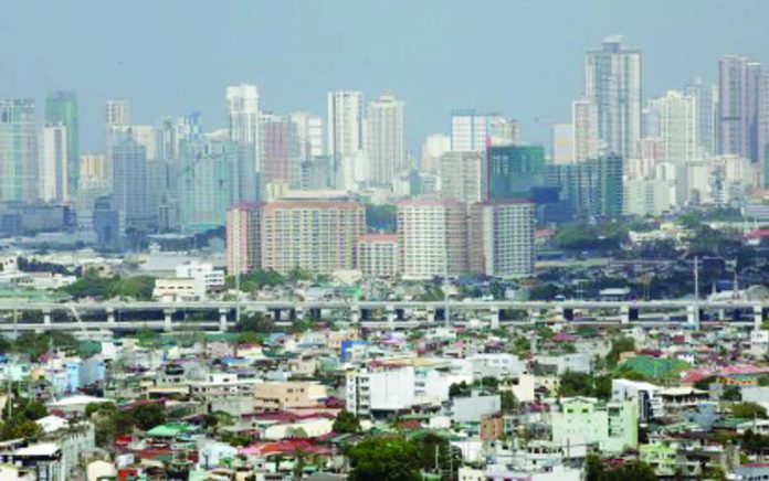 Study_forecasts_resized_compressed High-rise buildings as seen from the busy Makati City business district on March 14, 2025. The early release of budget to local government units and the projected continuation of a manageable inflation environment are seen to provide leeway for a five percent output for the domestic economy as early as the first quarter of 2026. PNA PHOTO BY YANCY LIM