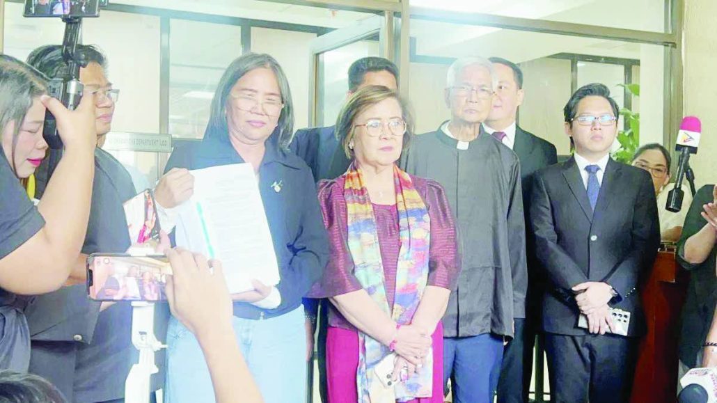 Religious groups, priests, and lawyers file with the House of Representatives on Monday, Feb. 9, 2026, the third impeachment complaint against Vice President Sara Duterte. They are accompanied by ML party-list’s Cong. Leila de Lima. LLANESCA T. PANTI/GMA INTEGRATED NEWS