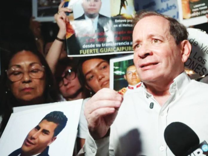 Venezuelan political leader Juan Pablo Guanipa speaks to the media after his release from Helicoide prison in Caracas. GETTY IMAGES