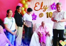 A CENTURY OF GRACE AND GRATITUDE. Passi City’s Mayor Stephen Palmares leads the turnover of a P150,000 cash incentive to 100-year-old Eleuteria David of Barangay Mambiranan Pequeño during a simple yet heartfelt celebration on Feb. 21, as city officials honor her remarkable milestone and lifelong legacy. PASSI CITY LGU
