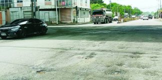 Potholes reappear at the intersection beneath the Ungka Flyover in Barangay Ungka II, Pavia, Iloilo just four days after the Department of Public Works and Highways carried out repair and asphalting works. Photos taken Sunday afternoon, February 15, show visible road surface deterioration and uneven pavement that continue to pose risks to motorists passing through the busy junction. AJ PALCULLO/PN