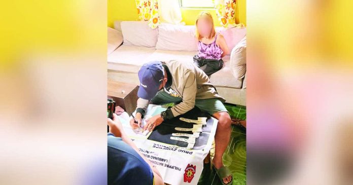 lambunao drug sting_superimposed_compressed A 53-year-old woman identified as alias “Jean,” a resident of Lambunao, Iloilo, yielded around 200 grams of suspected shabu with an estimated value of P1,360,000, on Feb. 3, 2026. Police tagged the suspect as a high-value individual. IPPO PHOTO