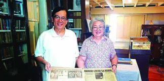 Nick Deocampo (left), chairman of the Memory of the World Committee of the UNESCO National Commission of the Philippines, and Pilar Martinez (right) of Makinaugalingon Press display an original copy of the historic Hiligaynon newspaper now inscribed in the UNESCO Philippines Memory of the World National Register, underscoring efforts to preserve Iloilo’s documentary heritage.