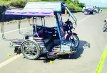 Tricycle driver gunned down in Murcia Officers from the Murcia Municipal Police Station investigate the crime scene in Barangay Sta. Rosa, Murcia, Negros Occidental following the shooting of tricycle driver Roger Bayotas on Wednesday morning, February 18, 2026. SCREENSHOT FROM BOMBO BACOLOD LIVESTREAM FACEBOOK VIDEO