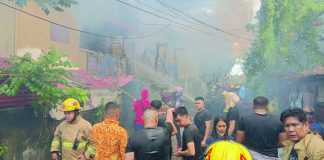Narrow streets and low-hanging power lines hampered firefighting efforts during a blaze in Barangay Benedicto, Jaro, Iloilo City, on Feb. 16, 2026. AJ PALCULLO/PN