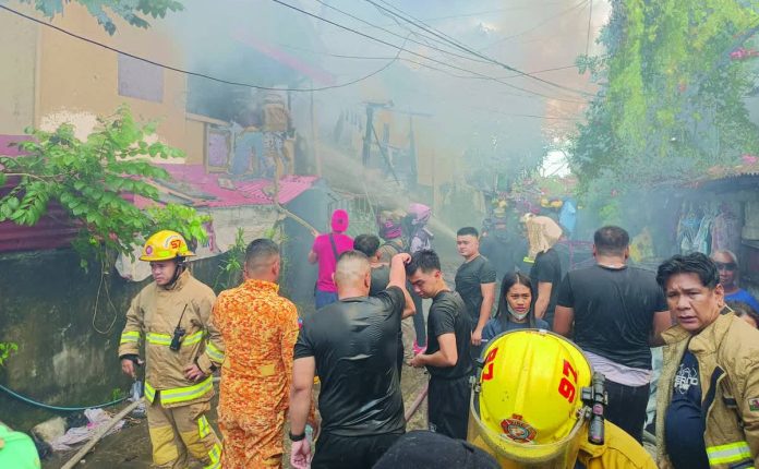 Narrow streets and low-hanging power lines hampered firefighting efforts during a blaze in Barangay Benedicto, Jaro, Iloilo City, on Feb. 16, 2026. AJ PALCULLO/PN