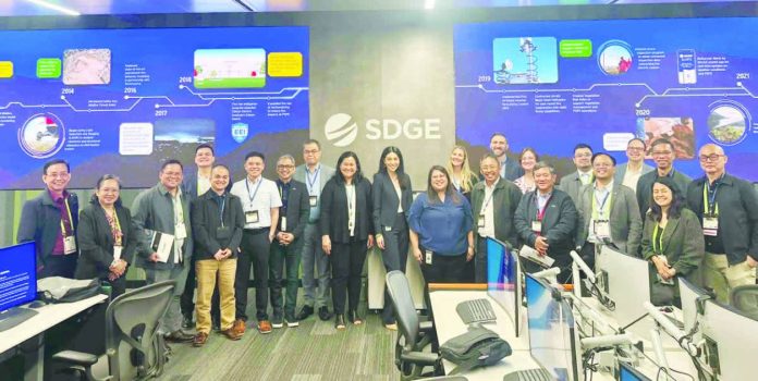 Officials and executives from MORE Electric and Power Corporation (MORE Power) led by President and Chief Executive Officer Roel Z. Castro and its parent firm Primelectric, together with representatives from Philippine energy agencies and private utilities, pose for photos during their participation in the Distribution Technology Conference and Exhibit (DTECH) in San Diego, California, hosted by the US Trade and Development Agency, where the delegation explored emerging power distribution technologies, grid modernization, and regulatory best practices for future-ready electricity service.