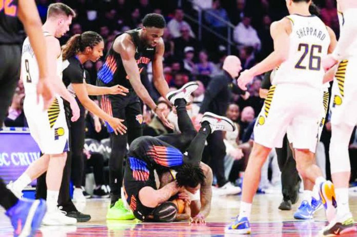 sports Indiana copy_compressed_compressed New York Knicks guard Jose Alvarado fights for control of the ball with Indiana Pacers guard Quenton Jackson. AP/YUKI IWAMURA