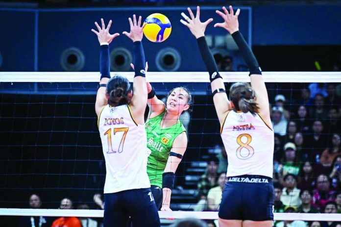 sports La Salle copy_compressed Shevana Laput once again anchored the offense for De La Salle University Lady Spikers. UAAP PHOTO