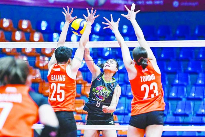 sports_Chameleons_resized_compressed Nxled Chameleons’ Myla Pablo scores against the defense of Farm Fresh Foxies’ Victonara Galang. PVL PHOTO