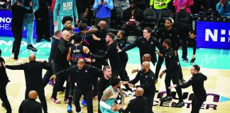 Moussa Diabate and Miles Bridges of the Charlotte Hornets fight Jalen Duren of the Detroit Pistons during the second half of a basketball game at Spectrum Center in Charlotte, North Carolina. PHOTO BY DAVID JENSEN/GETTY IMAGES