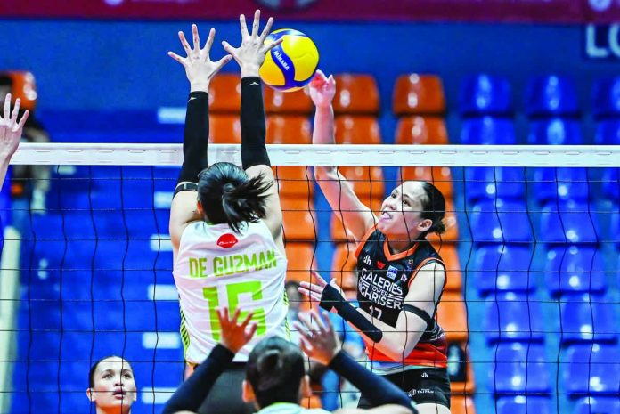 sports_Galeries_copy_resized_compressed Negrense Erika Jin Deloria of Galeries Tower Highrisers fires one against Nxled’s Lyann de Guzman. PVL PHOTO