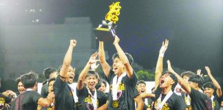 Members of the University of the Philippines Fighting Maroons celebrate after clinching the UAAP Season 88 men’s football championship at the Rizal Memorial Stadium. UAAP PHOTO