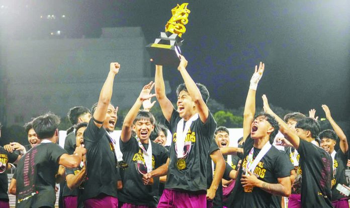sports_Maroons_resized_compressed Members of the University of the Philippines Fighting Maroons celebrate after clinching the UAAP Season 88 men’s football championship at the Rizal Memorial Stadium. UAAP PHOTO