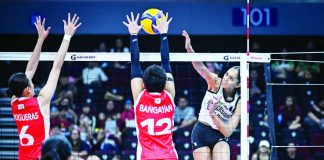 Casiey Dongallo of the University of the Philippines Fighting Maroons attacks against the defense of the University of the East Lady Warriors in their UAAP Season 88 opener at the SM Mall of Asia Arena. UAAP PHOTO