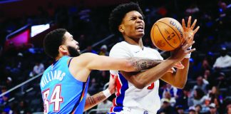Detroit Pistons' Ausar Thompson was hacked by the defense of Oklahoma City Thunder's Kenrich Williams. USA TODAY PHOTO