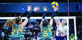 National University Lady Bulldogs' Evangeline Alinsug scores against the defense of Far Eastern University Lady Tamaraws' Tin Ubaldo. UAAP PHOTO