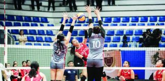 San Beda University Lady Red Spikers’ Janelle Bachar unloads a spike against two Lyceum Lady Pirates defenders during their straight-sets victory in NCAA Season 101 women’s volleyball at the San Andres Sports Complex. NCAA PHOTO