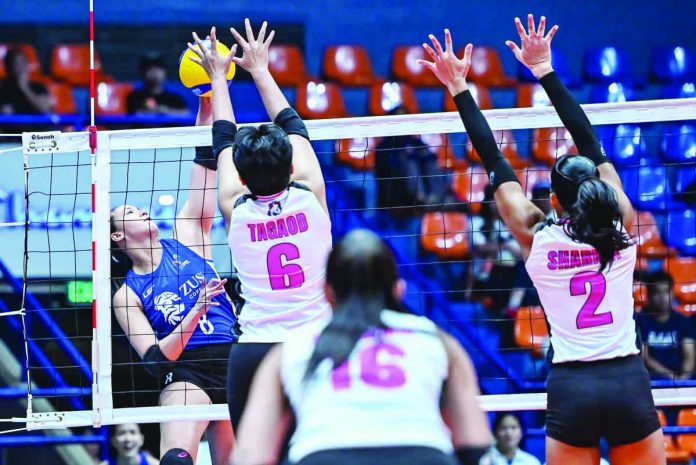 sports_Thunder_resized_compressed Guimarasnon Jovelyn Gonzaga of ZUS Coffee Thunderbelles unleashes an attack against Chenie Tagaod of Akari Power Chargers during their five-set thriller in the PVL All-Filipino Conference. PVL PHOTO