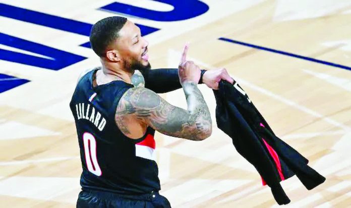 sports_injured.JPG_resized_resized_compressed Damian Lillard of the Portland Trail Blazers celebrates during a three-point contest as part of the 2026 NBA All-Star Weekend at the Intuit Dome in Inglewood, California. PHOTO BY ADAM HAGY/GETTY IMAGES
