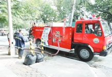 Firemen wait for their truck to be filled with water from a fire hydrant along Visayas Avenue in Quezon City. March is declared as Fire Prevention Month" under Proclamation 115-A signed by former President Ferdinand Marcos. PNA