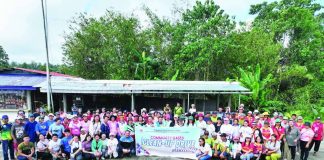 Personnel from CaPENRO and MENRO, joined by volunteers and 4Ps beneficiaries, collect plastic and other waste materials during a community-based clean-up drive along New Road in Pontevedra, Capiz, where a total of 297.7 kilograms of garbage were gathered. CAPENRO PHOTO