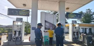 Personnel of the Philippine National Police (PNP) inspected gasoline stations in Roxas City to verify fuel prices following reports of unauthorized price increases amid global oil market tensions. BOMBO RADYO ROXAS PHOTO