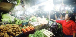 Fresh vegetables fill a stall at the Paco Public Market in Manila. President Ferdinand R. Marcos urged local government units to remove “pass-through fees” on vehicles transporting agricultural products and essential goods, saying the charges contribute to higher food prices. PNA