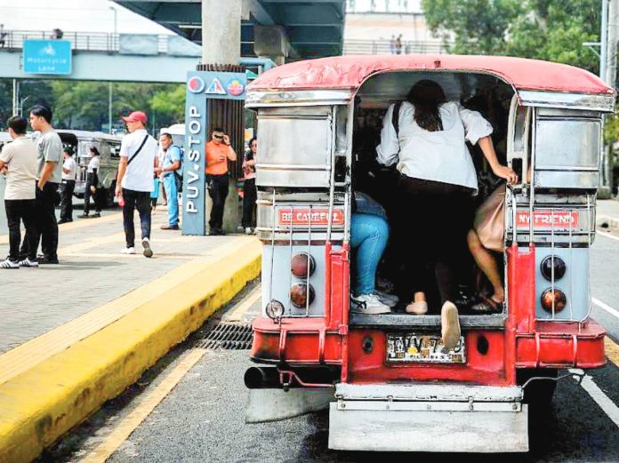 Fare increase copy Passengers board public utility vehicles at a designated stop along Commonwealth Avenue in Quezon City. The Land Transportation Franchising and Regulatory Board is studying a provisional fare increase for all public transport services amid the rise in fuel prices due to the worsening conflict in the Middle East. PNA