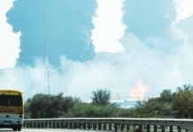 Smoke and flames rise from an energy installation in the Gulf emirate of Fujairah on March 14, 2026. The port of Fujairah in the United Arab Emirates, home to a major oil export terminal, was hit a drone strike on Saturday. AFP VIA GETTY IMAGES