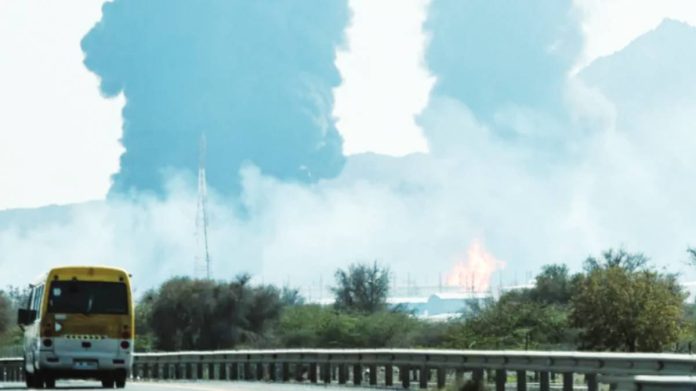 Hamas Smoke and flames rise from an energy installation in the Gulf emirate of Fujairah on March 14, 2026. The port of Fujairah in the United Arab Emirates, home to a major oil export terminal, was hit a drone strike on Saturday. AFP VIA GETTY IMAGES