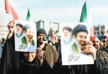 Iranians deeply divided over Khamenei son’s rise to power People in Tehran hold placards with an image of Iran’s new supreme leader Mojtaba Khamenei with late Iranian Supreme Leader Ayatollah Ali Khamenei. WANA/REUTERS