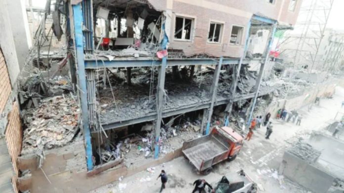 Iranians are clearing debris from damaged homes and walking past piles of rubble in the capital city of Tehran. Earlier, Israel said it had launched "wide scale" strikes on targets in western Iran.