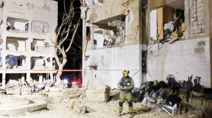 Israel copy A large Iranian missile shattered apartment blocks in Arad, southern Israel. REUTERS