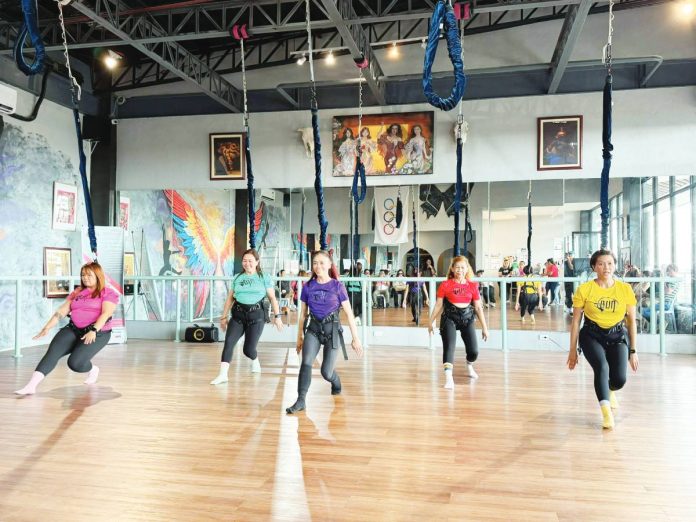 Bungee Physio at Bereber Health and Wellness Center proves that age is just a number. Photo show trainer and students alike take flight in Bungee Physio class.