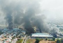 Mexico hunts 23 inmates sprung from jail during wave of violence An aerial photograph shows plumes of smoke over Puerto Vallarta. The prison break happened as a wave of violence rocked Puerto Vallarta and towns and cities in 19 other states. EPA